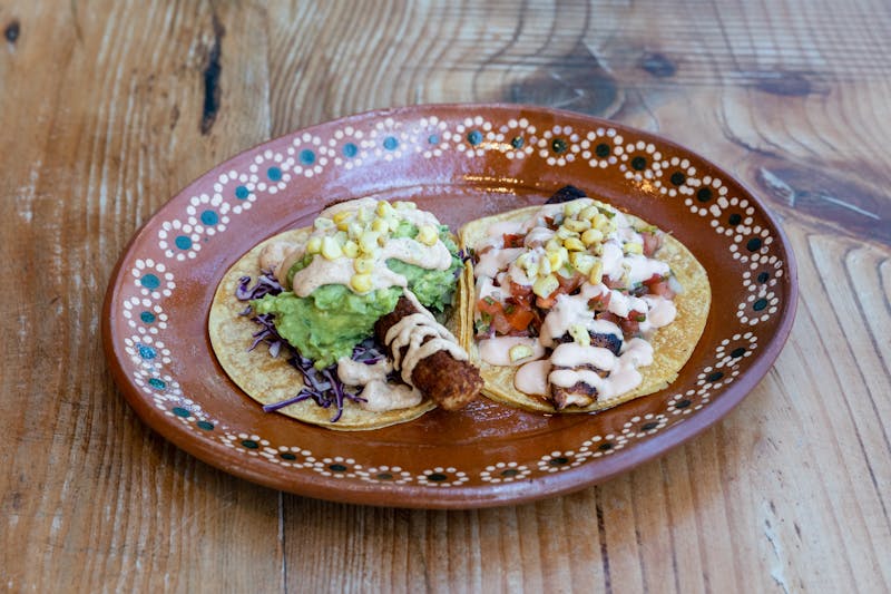 Costa Vida Chicken Street Tacos with cilantro and onion